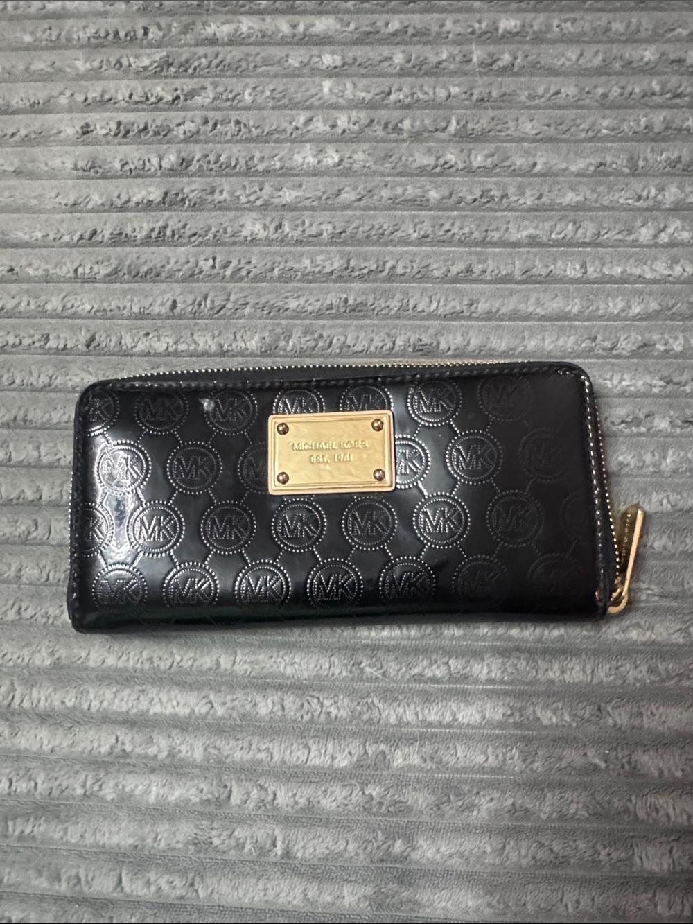 Michael Kors Black Patent Embossed MK Zip Around Wallet with Gold Plaque